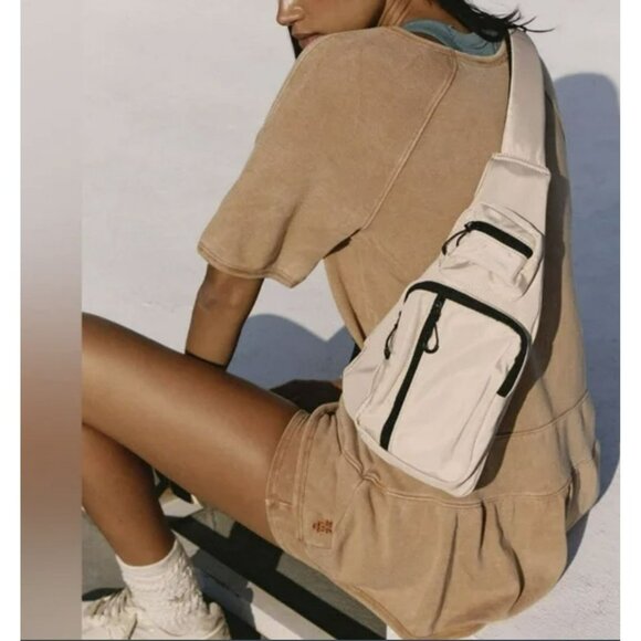 Free People Handbags - Free People Beige Sling Bag Multiple Zippered Pockets & Adjustable Strap NWT